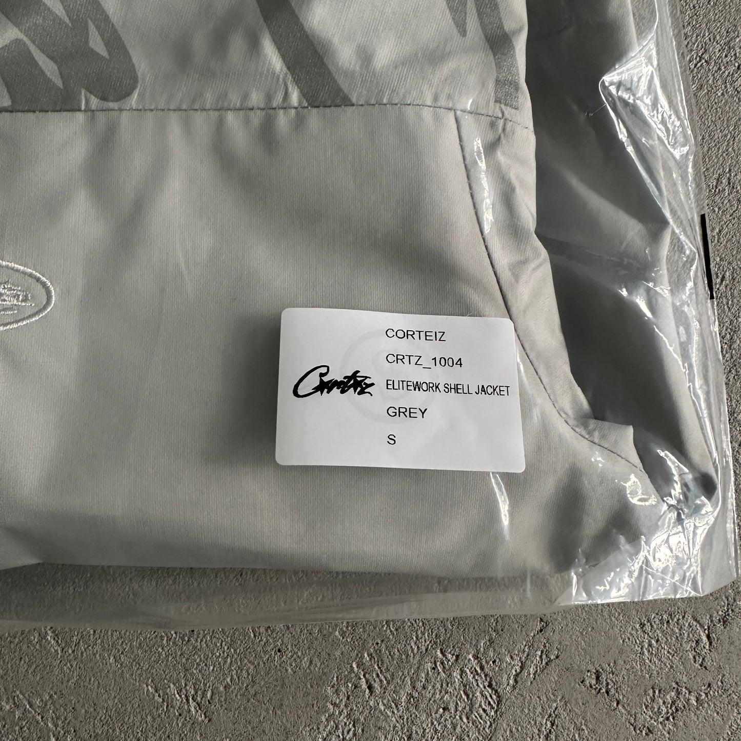 Corteiz elitework shell jacke-grey