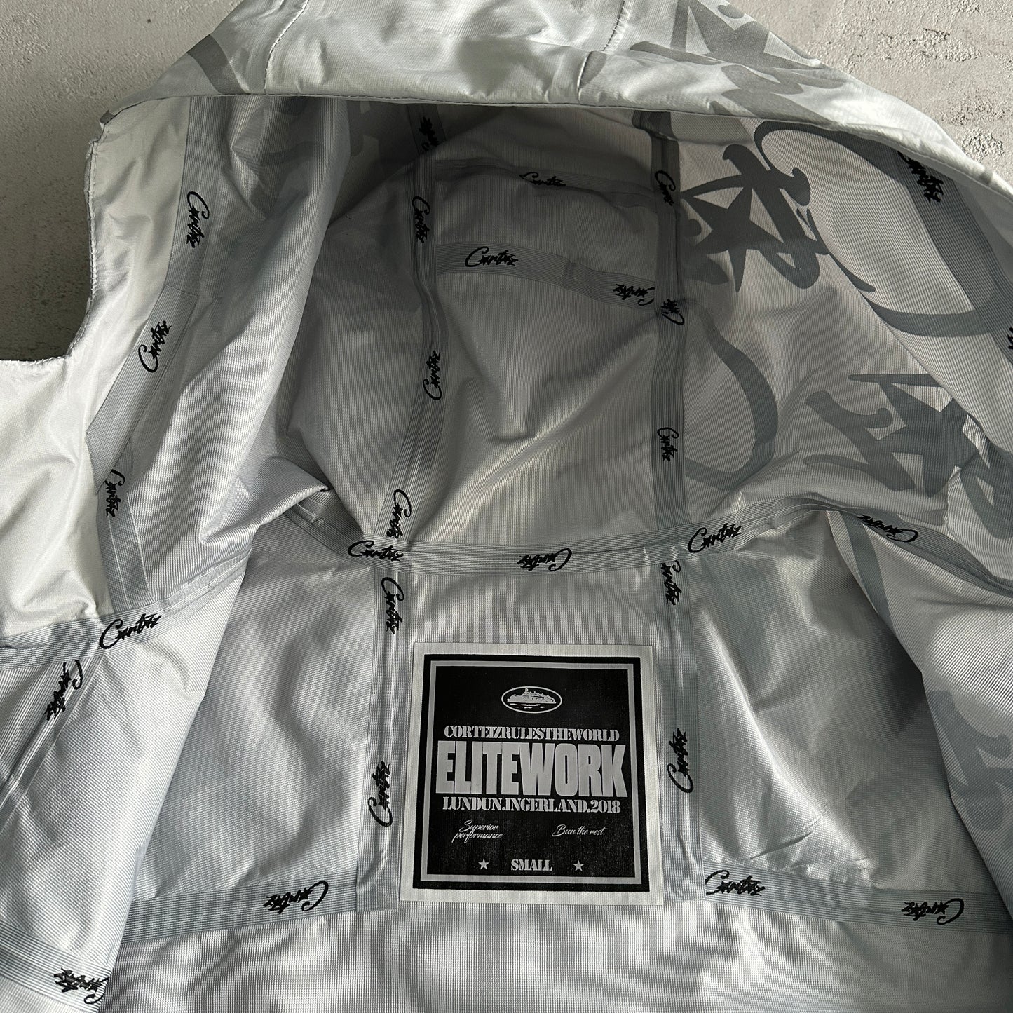 Corteiz elitework shell jacke-grey